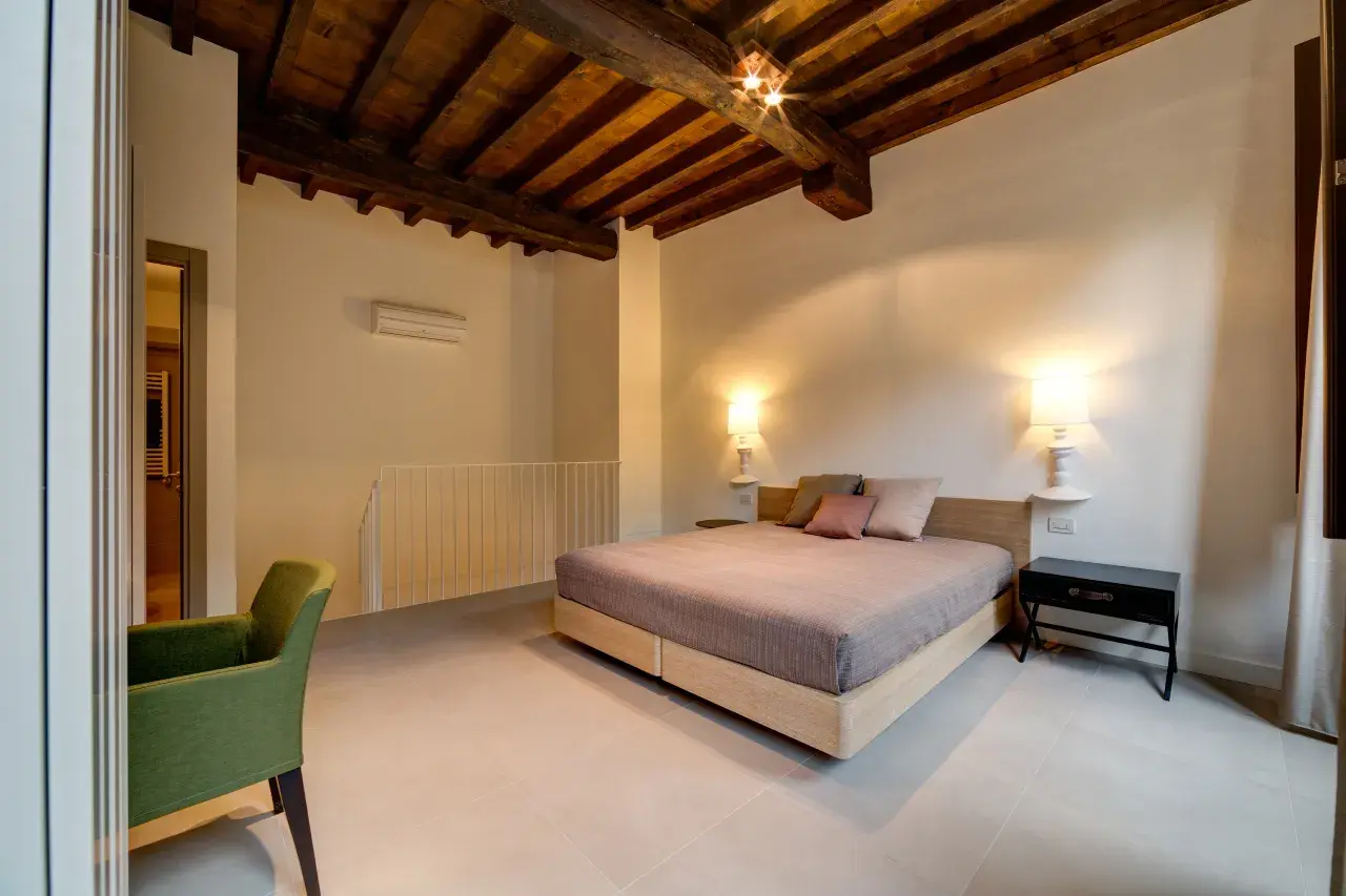 Upper-floor master bedroom of the Bilo Deluxe apartment.