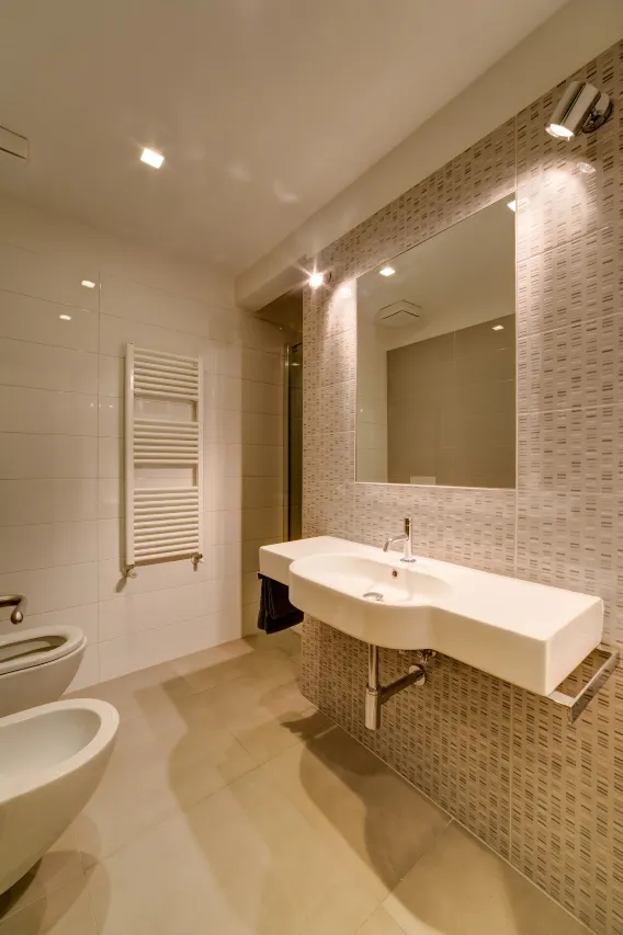 Bathroom with a large vanity sink in a Bilo View apartment.