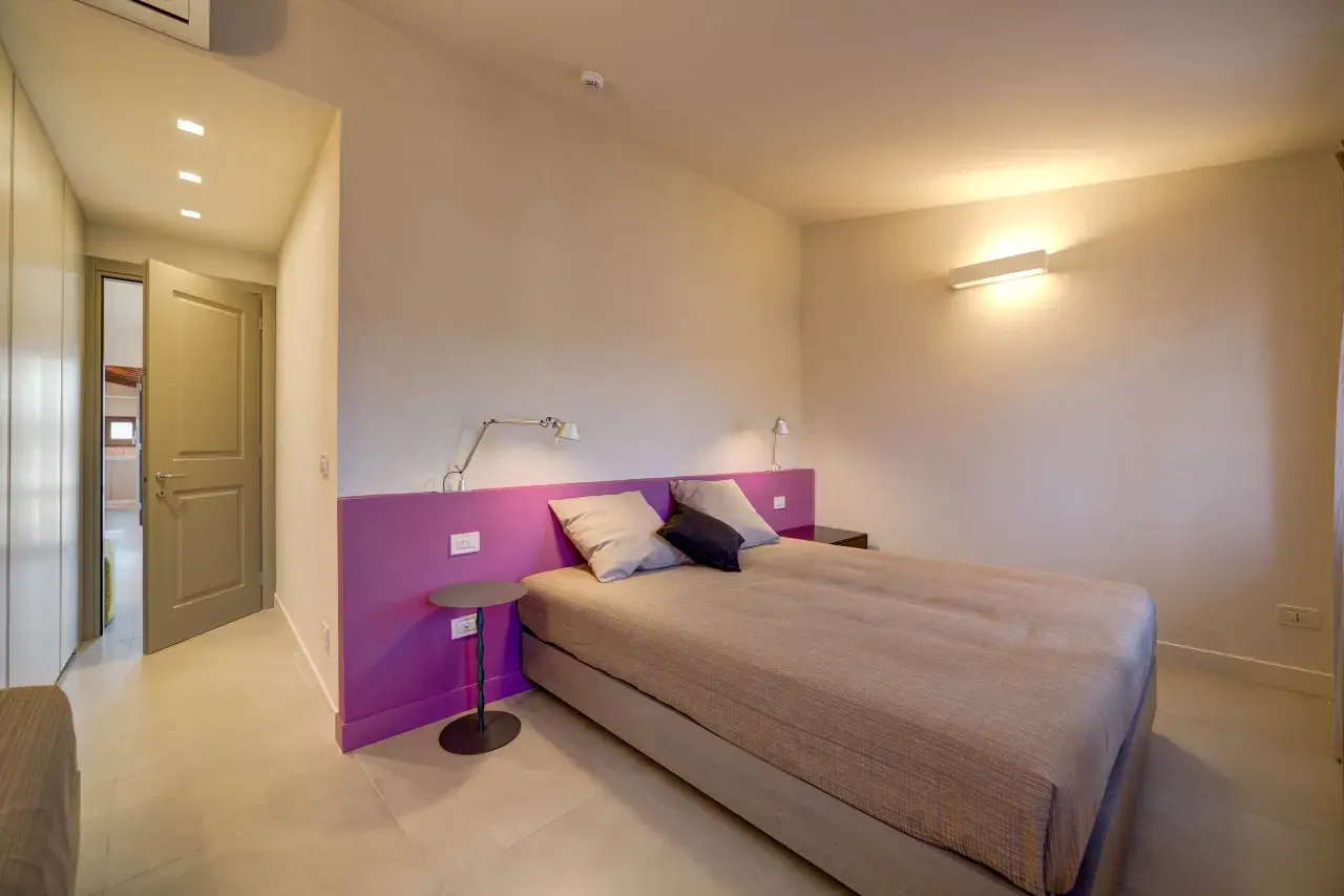 Spacious master bedroom of a Bilo View apartment.