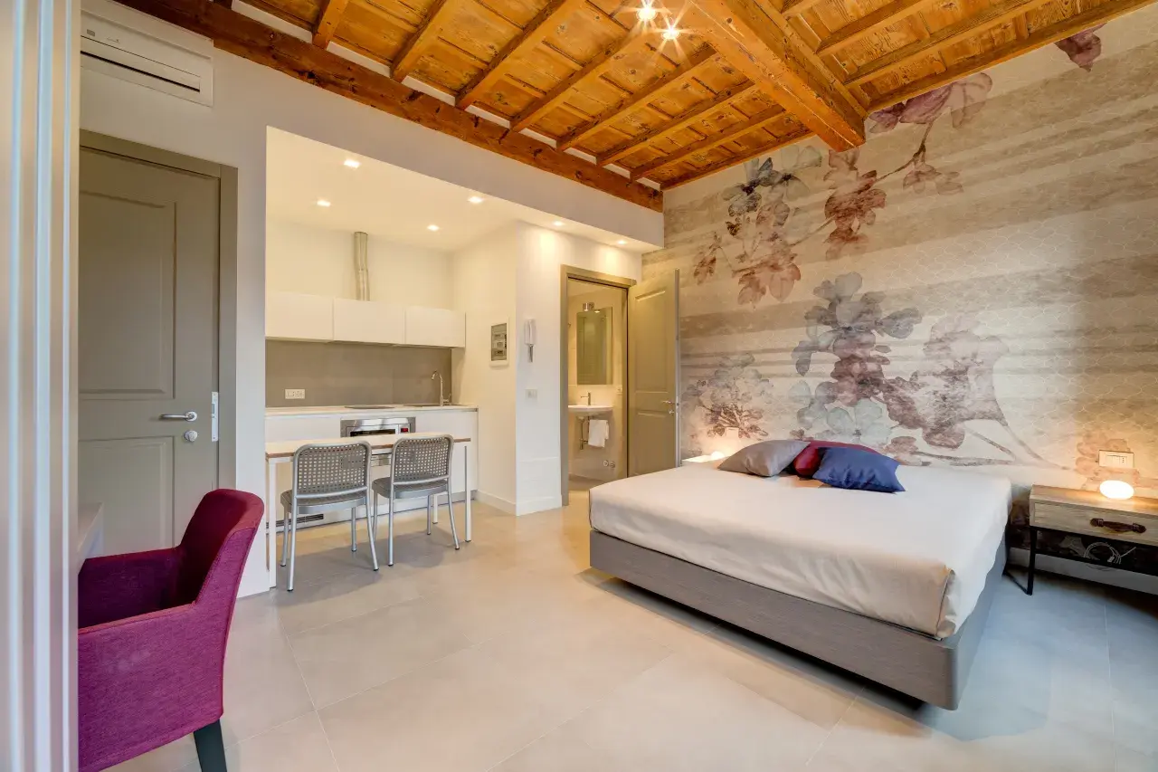 Perspective of the interior living spaces in the Mono Smart studio.