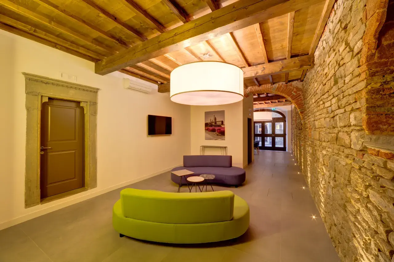 Relaxation lounge in the common areas of Palazzo Mannaioni, suites in Florence.